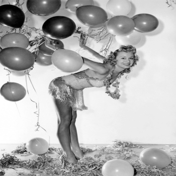 Holy Mackerel woman with balloons retro black and white photographic card featuring a vintage image of party glamour - 12.6 x 17.7cm and blank inside