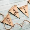 Personalised bunting with wooden letters for nursery decor. Name bunting. Wooden name sign. Wooden lettering. Wooden letters for wall - 1 letter - Oak flg/Walnut ltr
