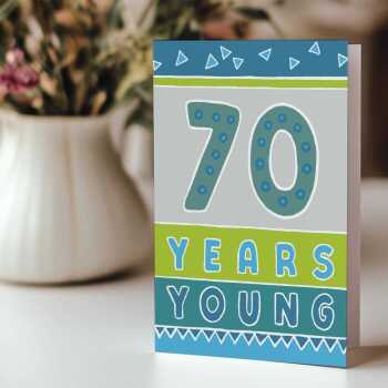 70 years young, a vibrant 70th birthday card in blues and greens with a fab printed envelope - 12 x 17cm and blank inside - made in the UK