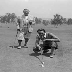 Holy Mackerel golfers retro black and white photographic card featuring a vintage image of two men in plus fours asessing a putt - 12.6 x 17.7cm and blank inside