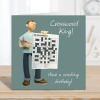 Crossword birthday card for him - designed by Erica Sturla and featuring a crossworder with his puzzle - 15cm square