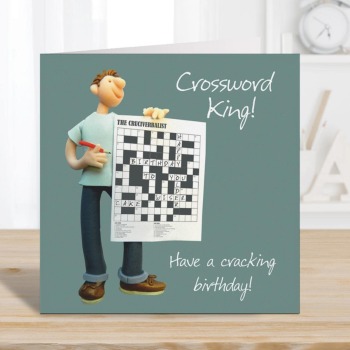 Crossword birthday card for him - designed by Erica Sturla and featuring a crossworder with his puzzle - 15cm square