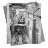 Boat being hauled through narrow street - vintage black and white themed card - 12.6 x 17.7cm and blank inside - made in the UK