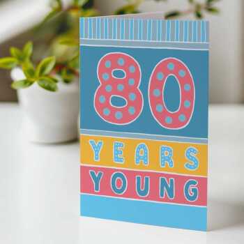 80 years young, a bright and fun 80th birthday card with a gorgeous printed envelope - 12 x 17cm and blank inside - made in the UK