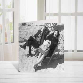 Dressed for the beach, vintage photographic card featuring sleeping couple in deck chairs  - 12.6 x 17.7cm and blank inside - made in the UK