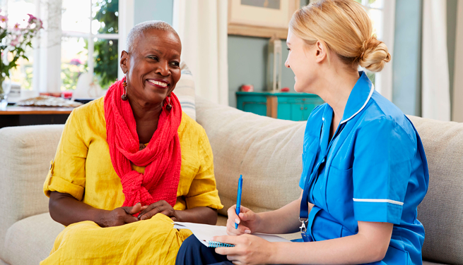 Qualified Healthcare Assistant providing clinical care and daily support to a patient in a care environment