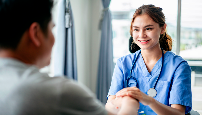 Registered Nurse conducting professional clinical care assessments and checking patient vitals