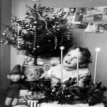 Little Girl and Candles - a 17.5 x 12.5cm Christmas Card from Holy Mackerel's Alternative Image Range of Festive Designs.