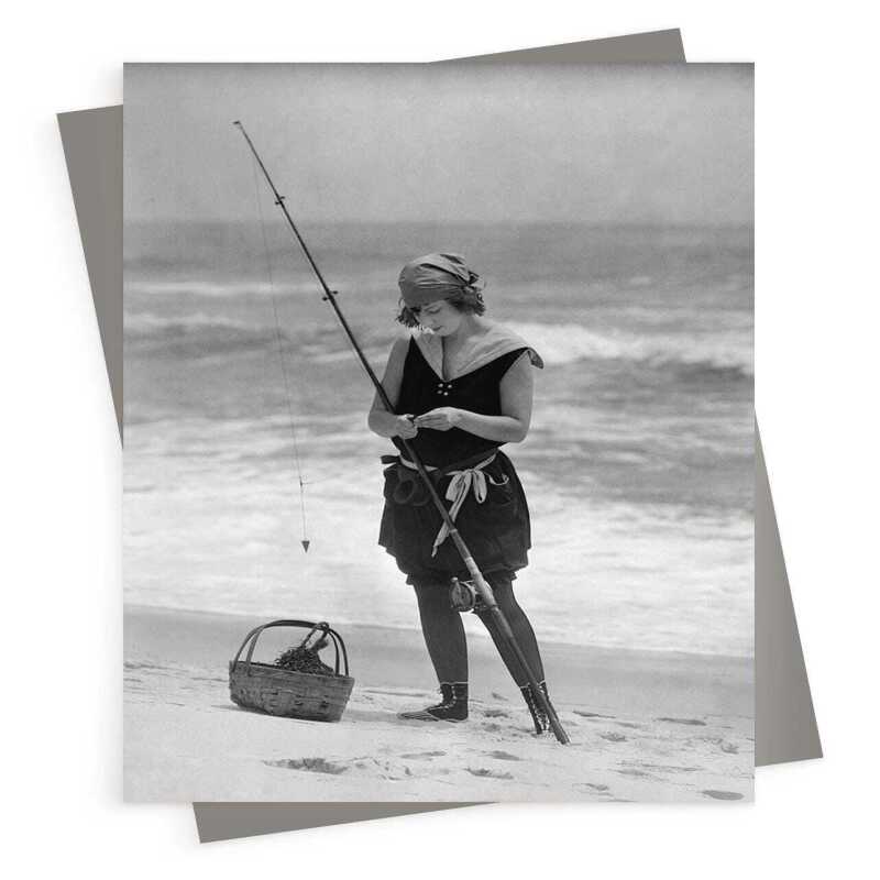 Woman fishing on the beach - vintage black and white themed card - 12.6 x 17.7cm and blank inside - made in the UK