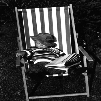 Holy Mackerel boy in deckchair retro black and white photographic card featuring a vintage image of a child on holiday - 12.6 x 17.7cm and blank inside