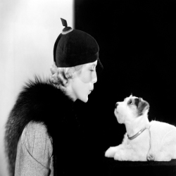 Model looking at dog