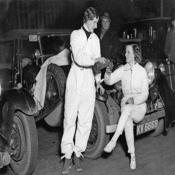 Holy Mackerel before the race retro black and white photographic card featuring a vintage image of female racing drivers having a coffee - 12.6 x 17.7cm and blank inside