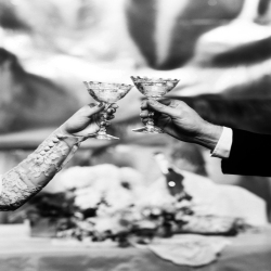 Holy Mackerel wedding toast retro black and white photographic card featuring a vintage image of raised champagne glasses - 12.6 x 17.7cm and blank inside