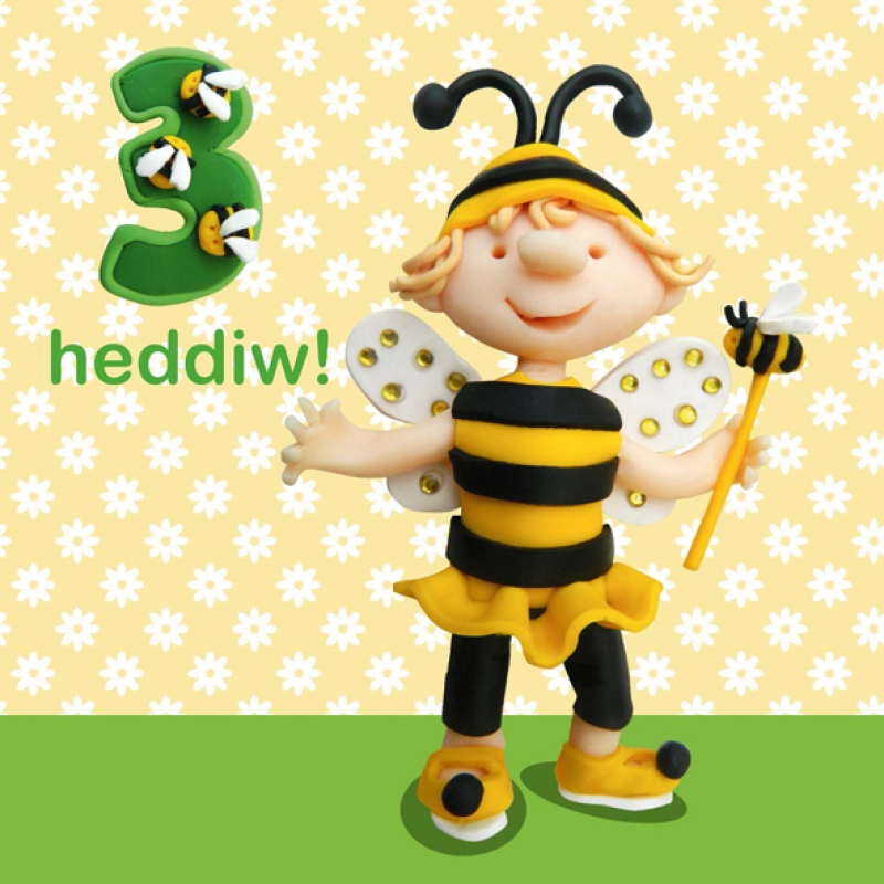 Holy Mackerel 3 Heddiw (three today) girl's Welsh 3rd birthday card featuring a bumblebee costume - designed by artist Erica Sturla - 15cm square and blank inside for your message - made in the UK