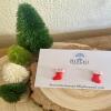 Cute little red clay Christmas stockings with a white silver glitter detail.