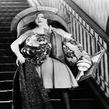 Holy Mackerel lampshade retro black and white photographic card featuring a vintage image of a woman with an unusual hat - 12.6 x 17.7cm and blank inside