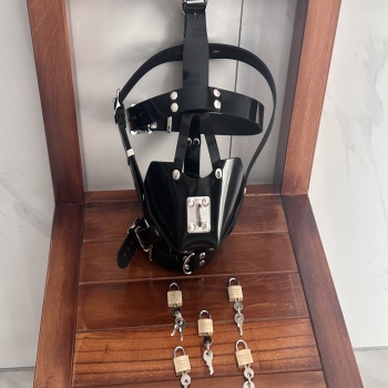 Lockable silicone bondage hood