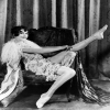 Holy Mackerel woman and stockings retro black and white photographic card featuring a vintage image of a girl straightening her nylons - 12.6 x 17.7cm and blank inside