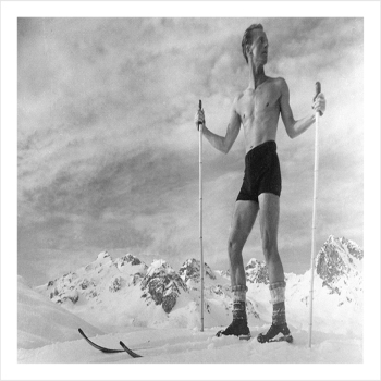 Skiing and sunbathing, a 127 x 175mm Alternative Image winter themed Christmas card featuring a vintage black and white photo, message inside says Happy Christmas