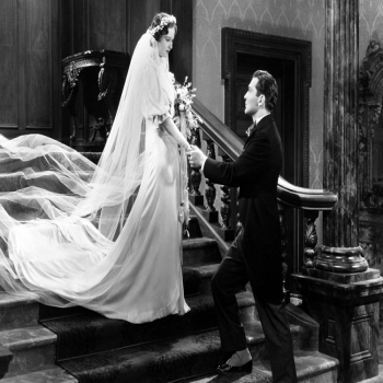 Holy Mackerel wedding day retro black and white photographic card featuring a vintage image of a bride and groom holding hands - 12.6 x 17.7cm and blank inside