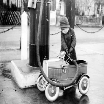 Holy Mackerel filling up retro black and white photographic card featuring a vintage image of children with their toy car - 12.6 x 17.7cm and blank inside