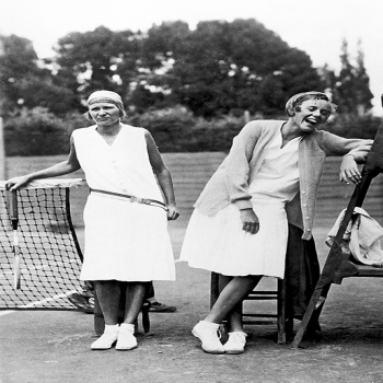 Holy Mackerel women on tennis court retro black and white photographic card featuring a vintage image of lady players laughing - 12.6 x 17.7cm and blank inside