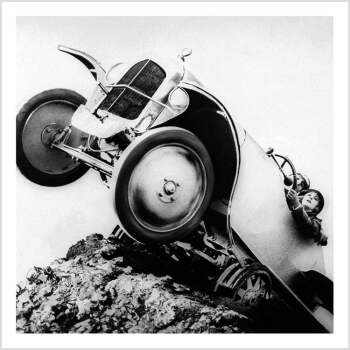 Holy Mackerel precarious position retro black and white photographic card featuring a vintage image of a car hanging over a cliff - 15cm square and blank inside