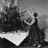 Mrs Porten Decorating The Tree - a 17.5 x 12.5cm Christmas Card from Holy Mackerel's Alternative Image Range of Festive Designs.