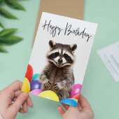 Fun Birthday Card Featuring A Cute Racoon and Colourful Birthday Balloons For Boys Or Girls Him Or Her