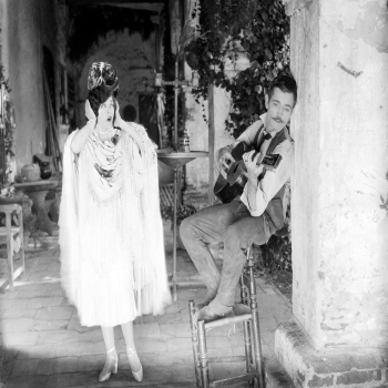 Holy Mackerel protecting her ears retro black and white photographic card featuring a vintage image of a woman experiencing an awful guitar serenade - 12.6 x 17.7cm and blank inside