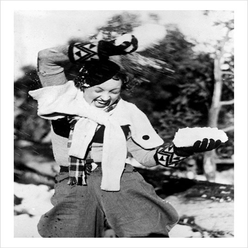 Woman Throwing snowballs - a 17.5 x 12.5cm Christmas Card from Holy Mackerel's Alternative Image Range of Festive Designs.