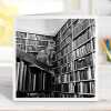 Library cat - vintage black and white themed card featuring a cat surrounded by books - 15cm square and blank inside - made in the UK
