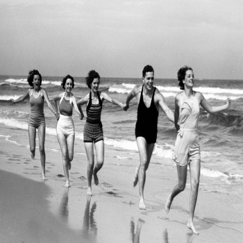 Holy Mackerel Holding hands on the beach retro black and white photographic card featuring a vintage image of friends at the seaside - 12.6 x 17.7cm and blank inside
