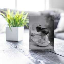 Bathtime, black and white vintage photographic card featuring a baby having a bath - 12.6 x 17.7cm and blank inside - made in the UK