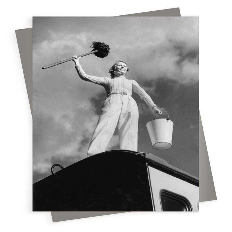 Mop and bucket, black and white photographic card featuring a woman cleaning a caravan - 12.6 x 17.7cm and blank inside - made in the UK