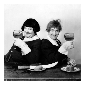 Holy Mackerel Laurel and Hardy make a toast retro black and white photographic card featuring a vintage image of the movie comedians with glasses of wine - 15cm square and blank inside