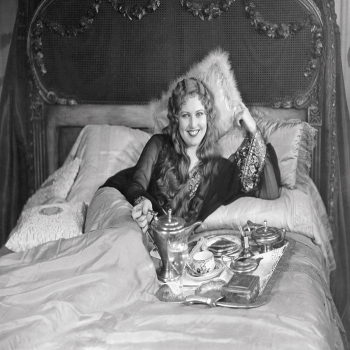 Holy Mackerel breakfast in bed retro black and white photographic card featuring a vintage image of a fashionable woman pouring tea - 12.6 x 17.7cm and blank inside