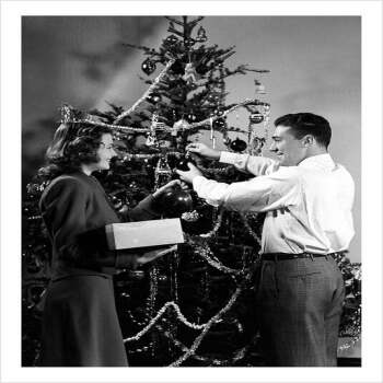 Couple Decorating Tree - a 17.5 x 12.5cm Christmas Card from Holy Mackerel's Alternative Image Range of Festive Designs.