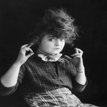 Holy Mackerel fingers crossed retro black and white photographic card featuring a vintage image of a girl hoping for good luck - 12.6 x 17.7cm and blank inside