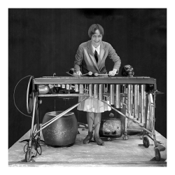 Holy Mackerel enthusiastic xylophone player retro black and white photographic card featuring a vintage image of a woman playing the percussion instrument - 15cm square and blank inside