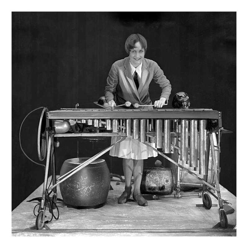 Holy Mackerel enthusiastic xylophone player retro black and white photographic card featuring a vintage image of a woman playing the percussion instrument - 15cm square and blank inside
