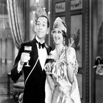 Couple raising glasses