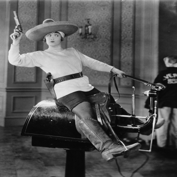 Holy Mackerel cowgirl retro black and white photographic card featuring a vintage image of a woman on an unusual horse - 12.6 x 17.7cm and blank inside