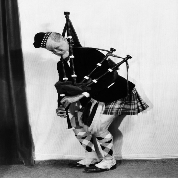 Holy Mackerel kilt and bagpipes retro black and white photographic card featuring a vintage image of a comedy character in Scottish costume - 12.6 x 17.7cm and blank inside