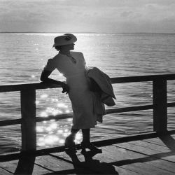 Holy Mackerel on the boardwalk retro black and white photographic card featuring a vintage image of a fashionable woman on a pier - 12.6 x 17.7cm and blank inside