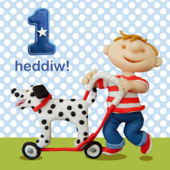 Holy Mackerel 1 Heddiw (one today) boy's Welsh 1st birthday card featuring a toy dog - designed by artist Erica Sturla - 15cm square and blank inside for your message - made in the UK