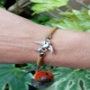 Gold kids bracelet with a Bird Charm