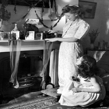 Hanging up Stockings - a 17.5 x 12.5cm Christmas Card from Holy Mackerel's Alternative Image Range of Festive Designs.