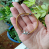 Gold kids bracelet with a Bird Charm