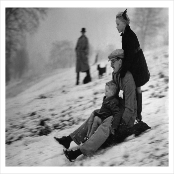 Family tobogganing on Hampstead Heath, London, a 127 x 175mm Alternative Image winter themed Christmas card featuring a vintage black and white photo, message inside says Happy Christmas